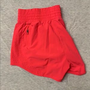 Bright pink athletic shorts
